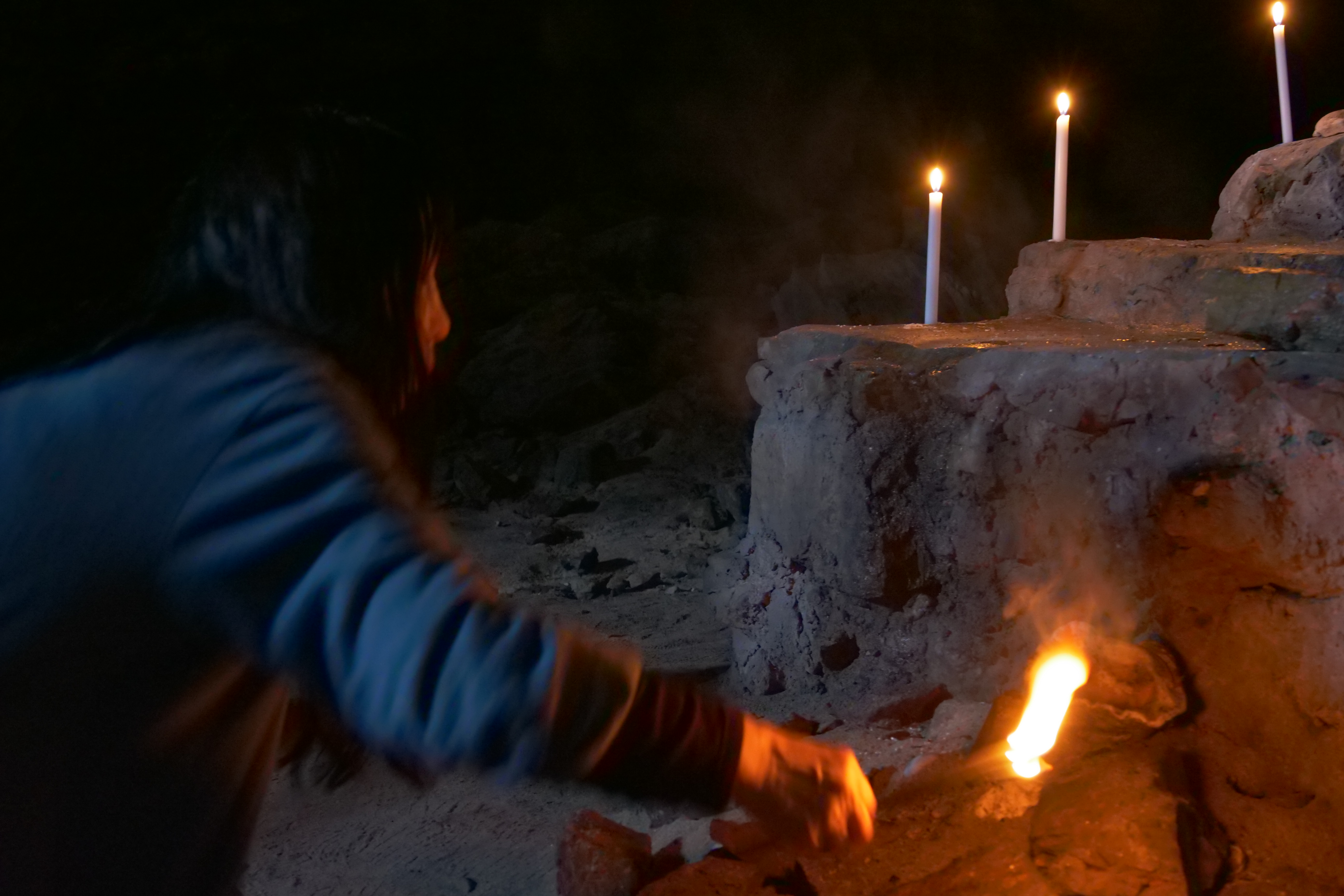 Candle flame in cave